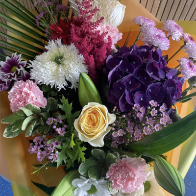 Perfect Daydream - A delightful handtied bouquet in water presented in a gift box/bag. Created using pale pink, purple and yellow flowers with complimentary foliage. Hand delivered with care in and around Newcastle by Fantasia Florist.